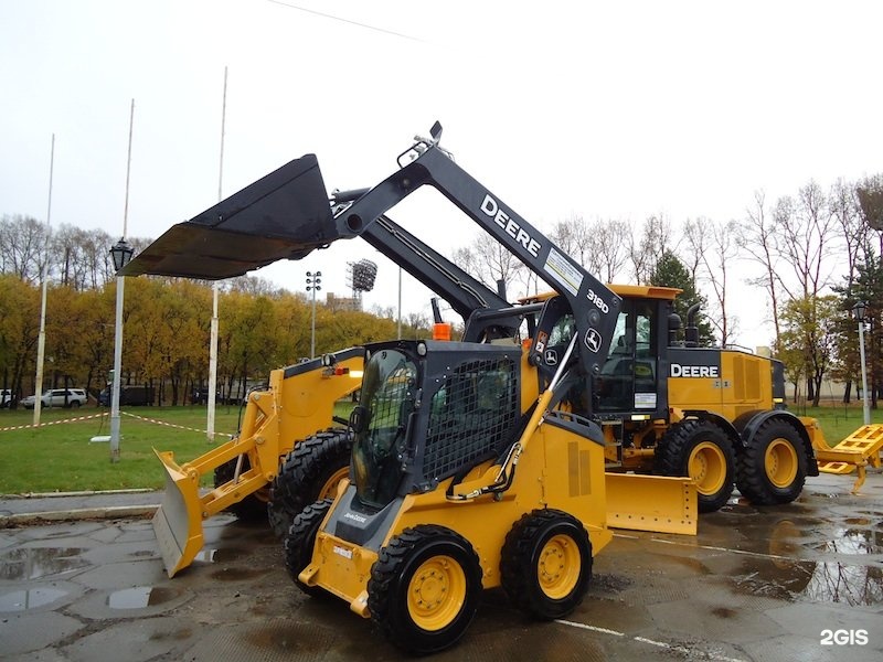 Дальтимбермаш. Погрузчик John Deere 318d. Дальтимбермаш Владивосток. Дальтимбермаш Благовещенск фото.